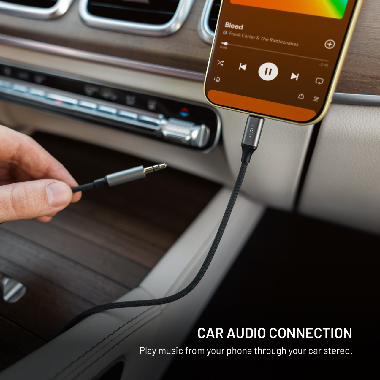 Audio kabel FIXED Lightning na jack 1,5 m šedý