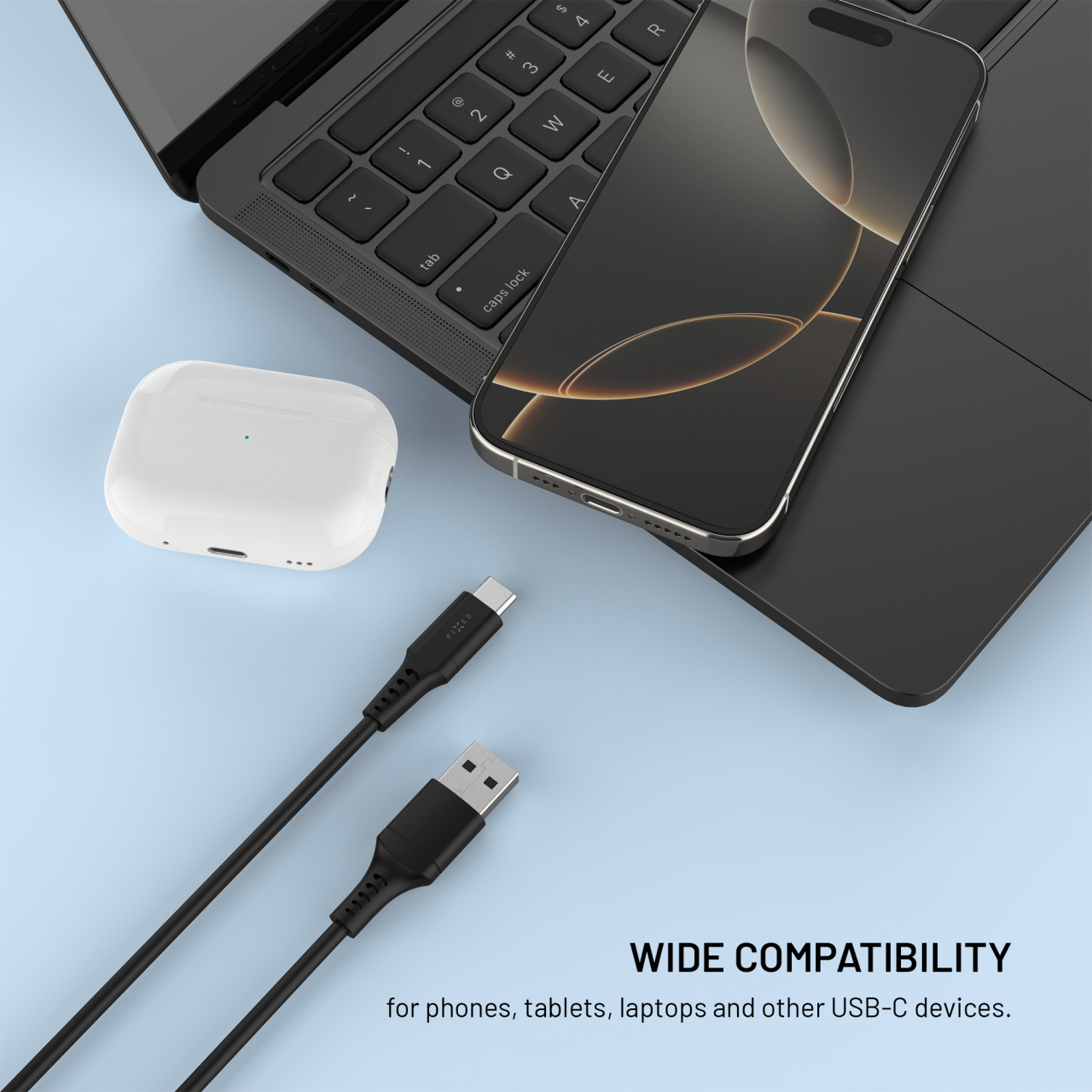 Krátký nabíjecí a datový Liquid silicone kabel FIXED s konektory USB/USB-C a podporou PD, 0.3m, USB 2.0, 60W, černý